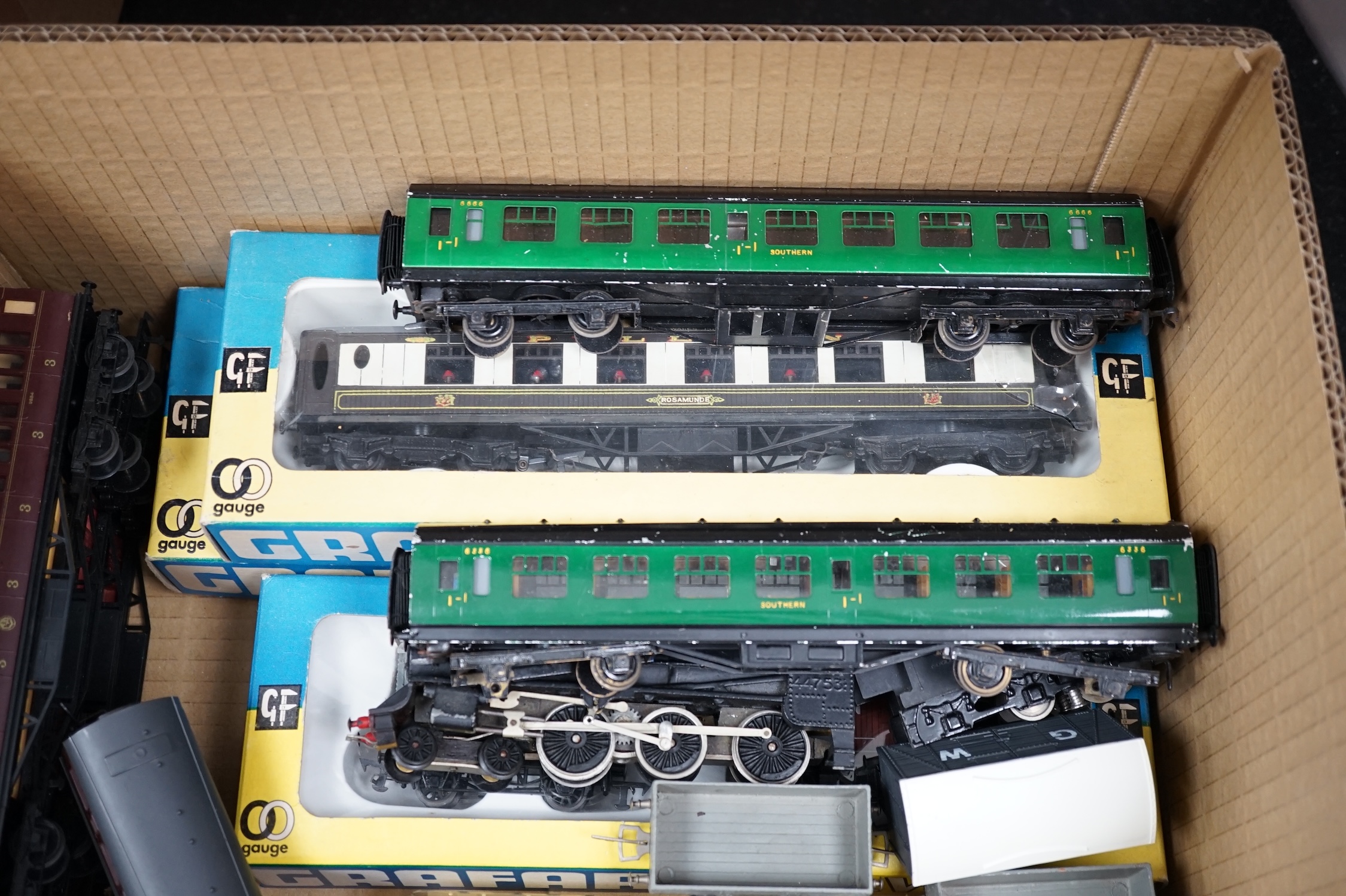 A collection of 00 gauge model Railway by Graham Farish, Exley, etc. including two locomotives; a GWR Prairie Tank loco, plus the remains of another, and a BR Class 5 4-6-0 tender loco, two boxed Pullman cars, freight wa
